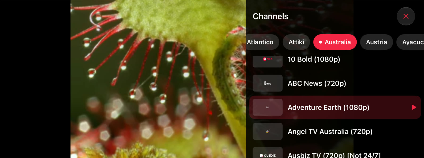 A live channel playing on a car's screen with DriveIn's channel drawer open: group chips with Australia chosen, and a list of channels with their logos.